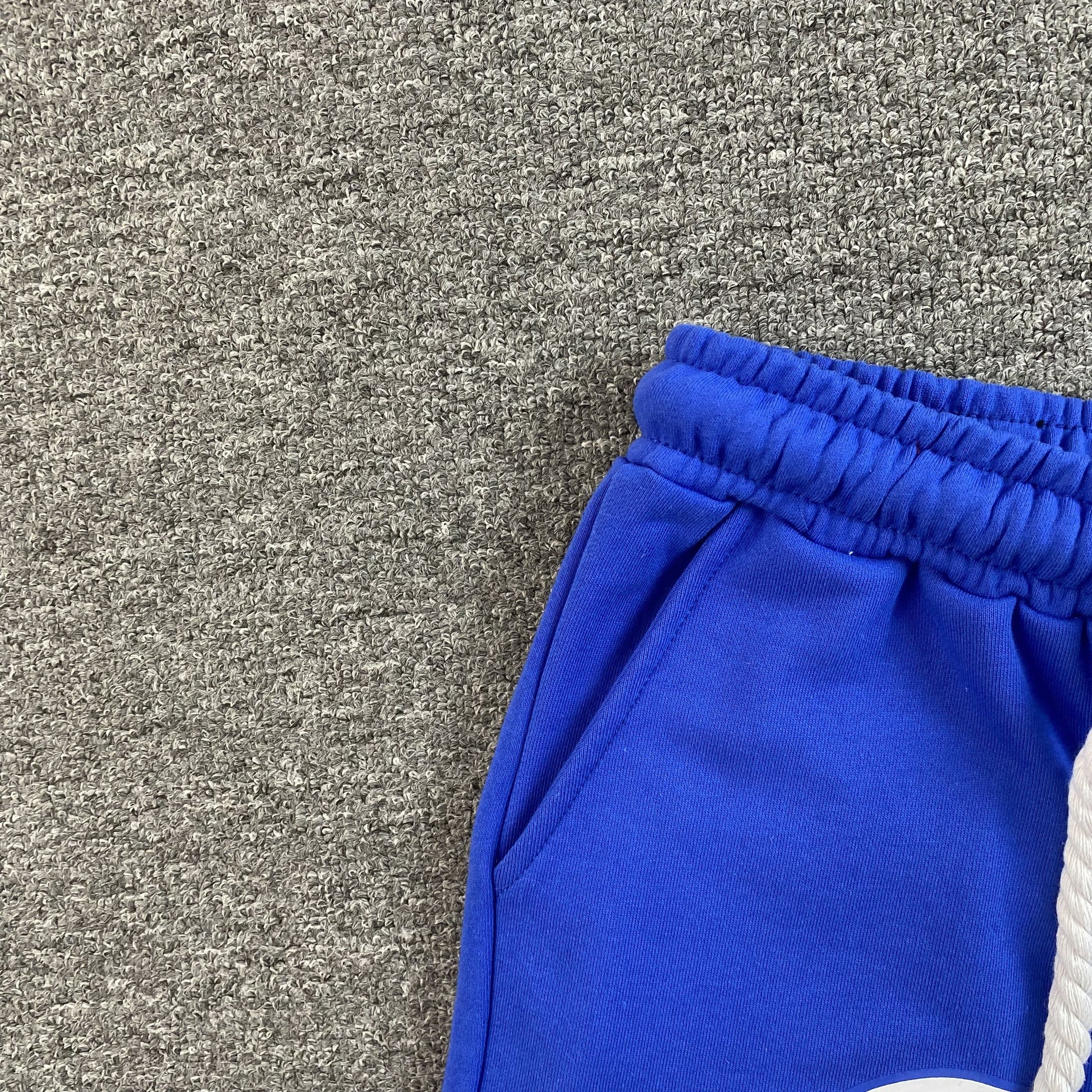 SYNA WORLD SHORTS BLUE Status Shipping