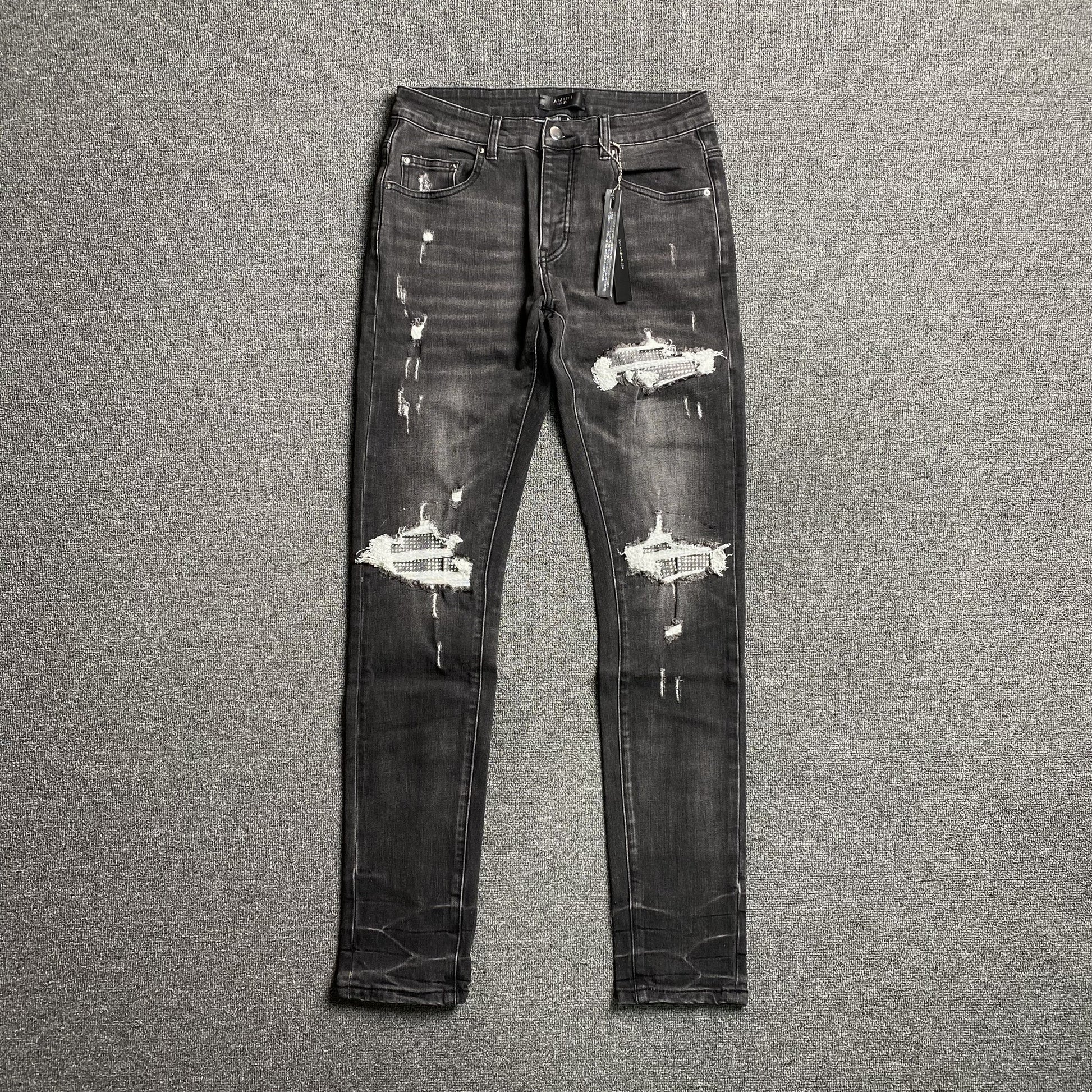 AMIRI SLASH SLIM JEANS Status Shipping