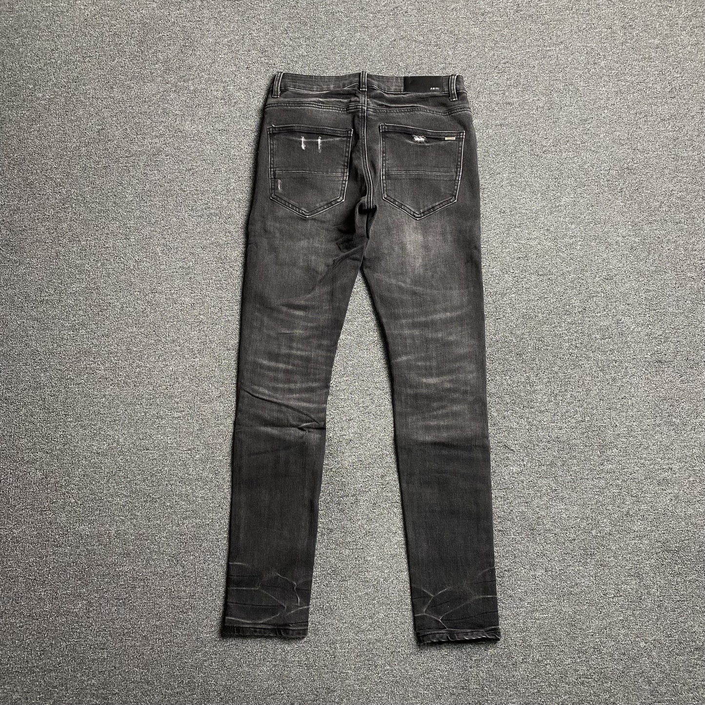 AMIRI SLASH SLIM JEANS Status Shipping