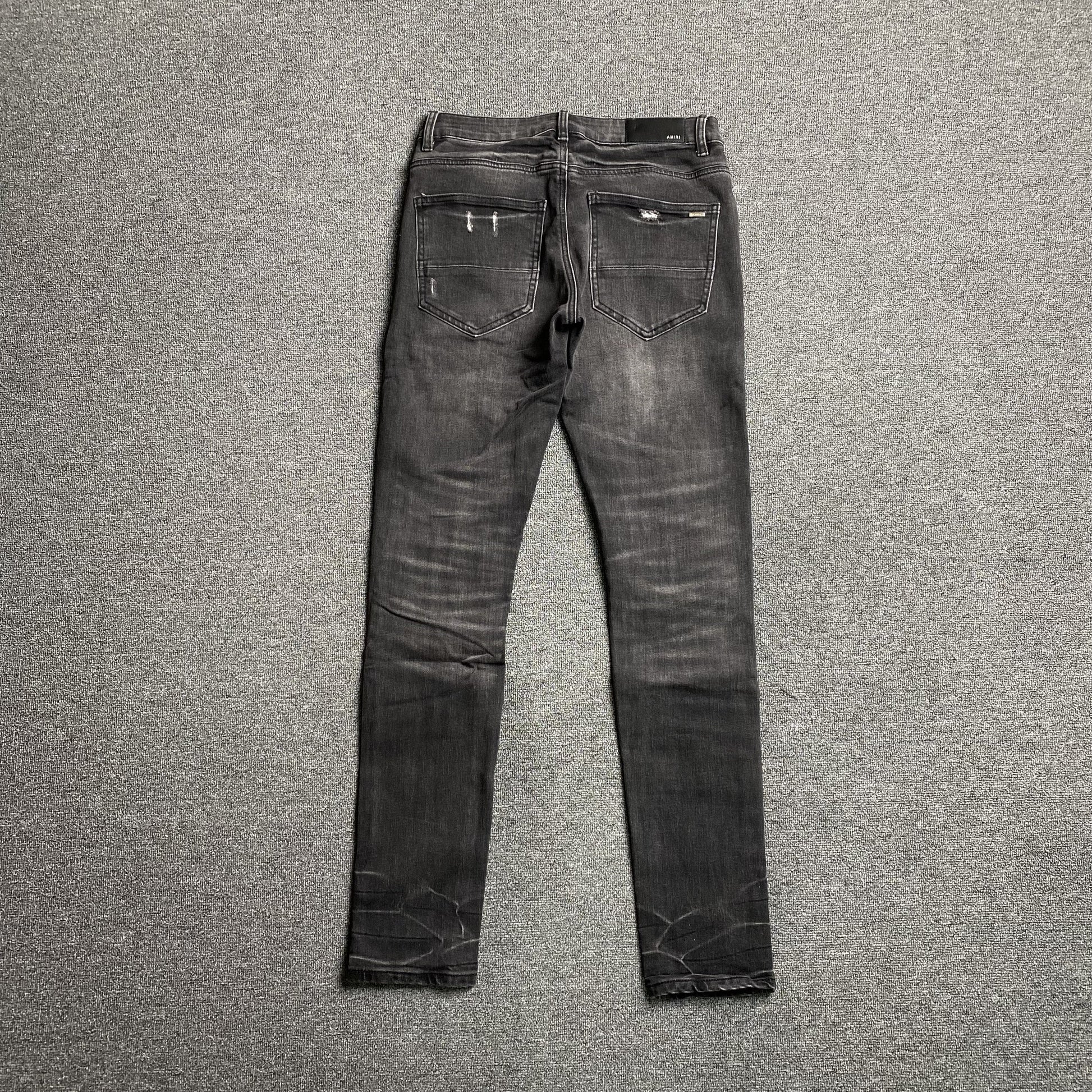 AMIRI SLASH SLIM JEANS Status Shipping