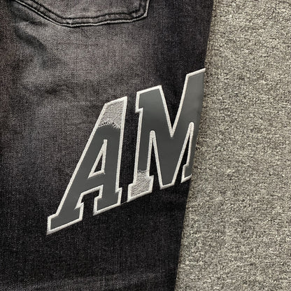 AMIRI VARSITY LOGO REPAIR JEANS Status Shipping