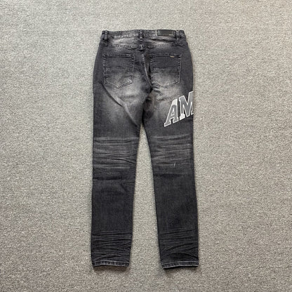 AMIRI VARSITY LOGO REPAIR JEANS Status Shipping