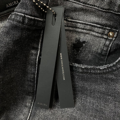 AMIRI VARSITY LOGO REPAIR JEANS Status Shipping