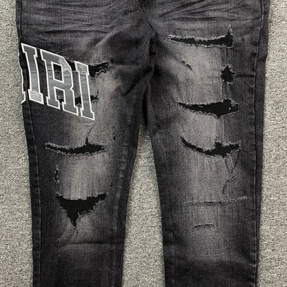 AMIRI VARSITY LOGO REPAIR JEANS Status Shipping