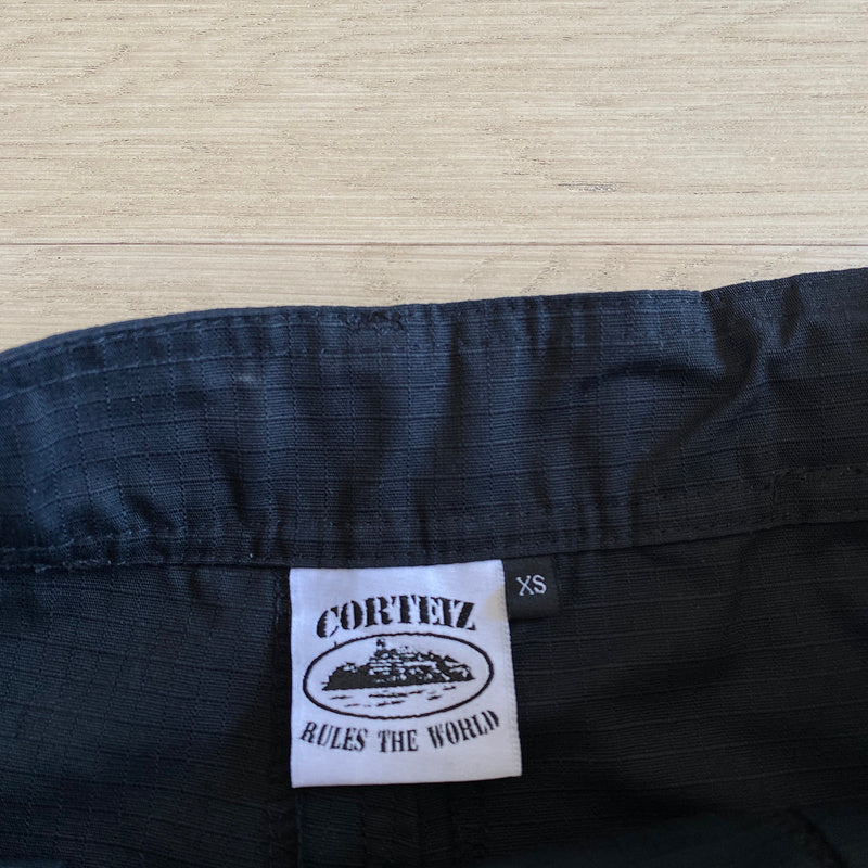 CORTEIZ ALCATRAZ CARGO PANTS BLACK/WHITE Status Shipping