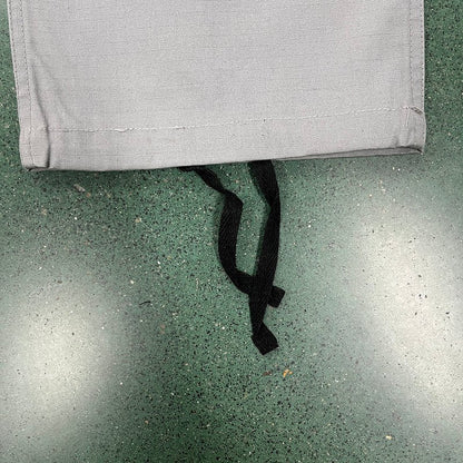 CORTEIZ CARGO PANTS STONE GREY Status Shipping