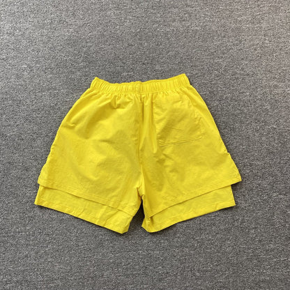 SP5DER DOUBLE LAYER SHORTS YELLOW Status Shipping