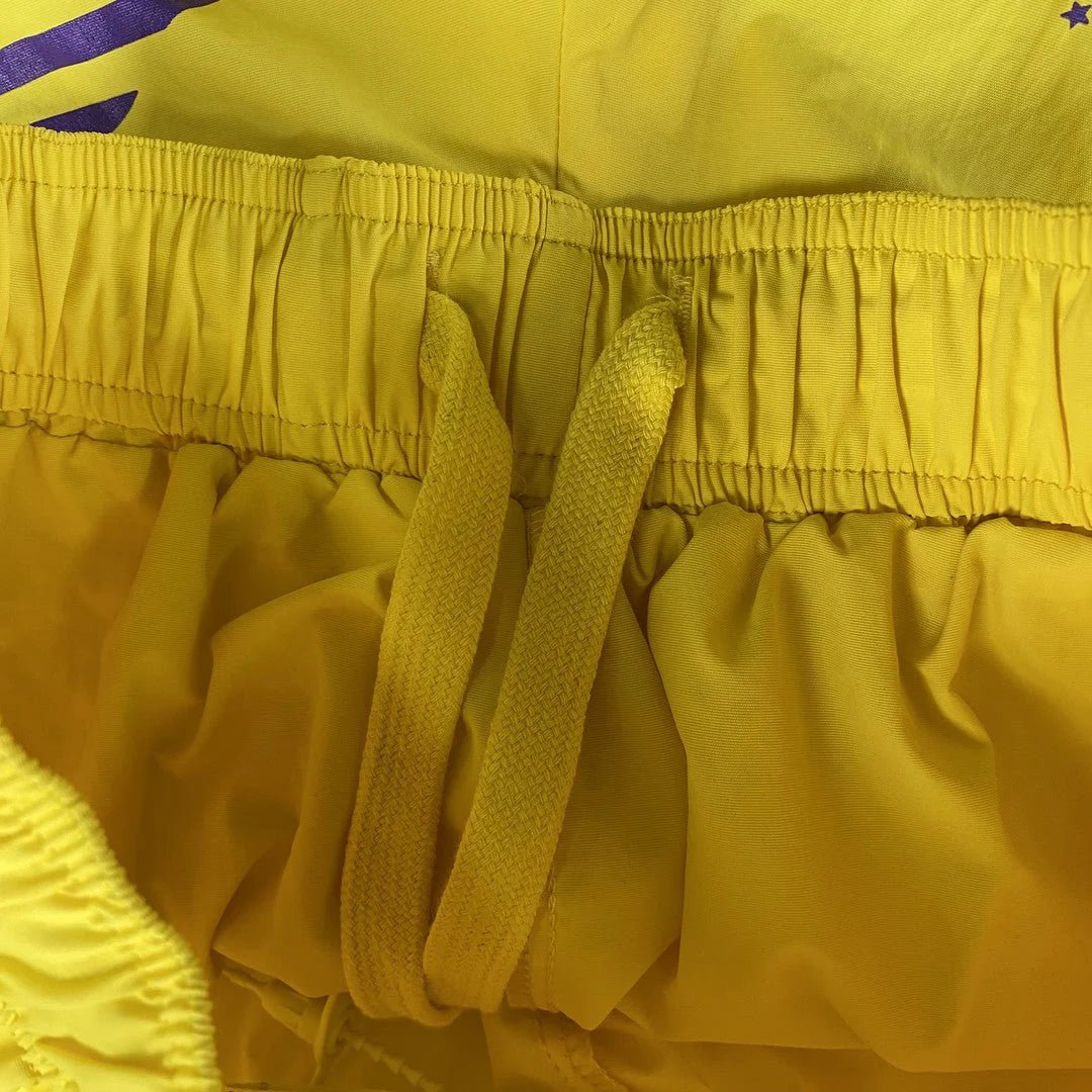 SP5DER DOUBLE LAYER SHORTS YELLOW Status Shipping